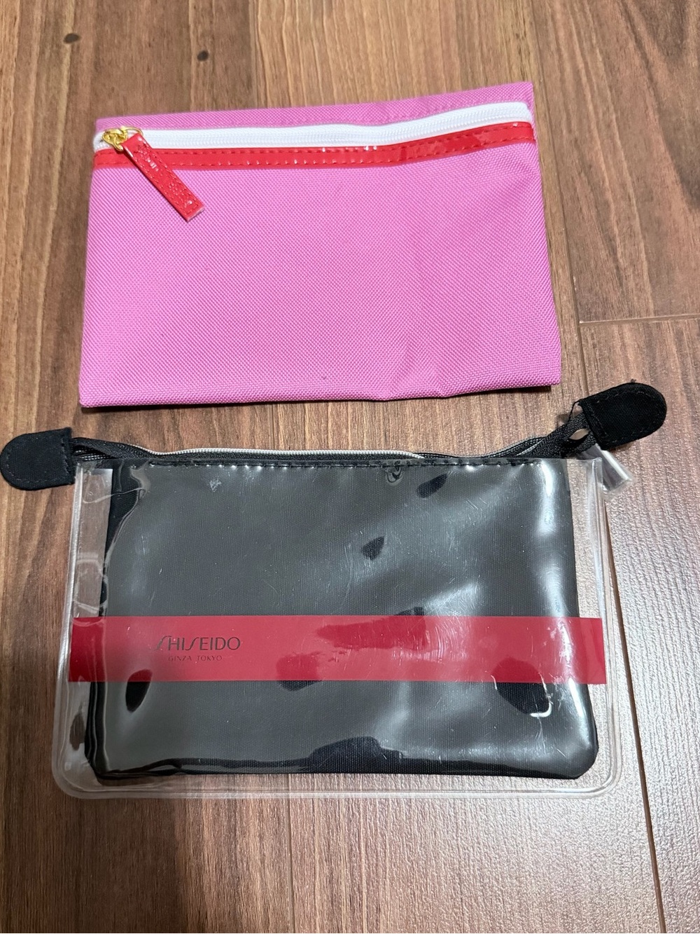 Shiseido Pink Cosmetic Pouch with Red Zip and Black Clear Travel Case